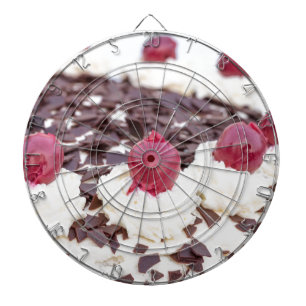 Black Forest cake in detail with white background Dartboard