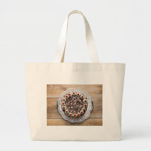 Black Forest cake on rustic wood Large Tote Bag