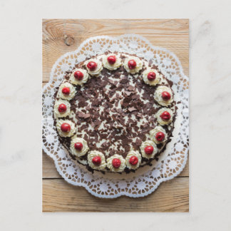 Black Forest cake on rustic wood Postcard