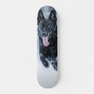 Black German Shepherd in snow Duvet Cover Skateboard