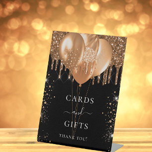 Black gold balloons cards gifts sign