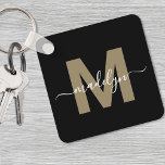 Black Gold Elegant Name Monogram Key Ring<br><div class="desc">Create Your Own Stylish Modern Custom Black and White Monogram Square Keychain. This sleek square keychain brings a modern and personalised touch to your everyday essentials. The design features a faux gold monogram initial (flat colour only—no shimmer or shine) centred on a solid black background, with your name in elegant...</div>