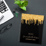 Black gold glitter drips monogram 2024 planner<br><div class="desc">A chic black background with trendy faux gold glitter drips, paint dripping look. Personalise and add a year, name and a title. The name is written with a modern hand lettered style script with swashes. Perfect for school, work or organising your personal/family life. To keep the swashes only delete the...</div>