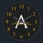 Black Gold Modern Script Girly Monogram Name<br><div class="desc">Black and Gold Simple Script Monogram Name Clock. This makes the perfect sweet 16 birthday,  wedding,  bridal shower,  anniversary,  baby shower or bachelorette party gift for someone that loves glam luxury and chic styles.</div>