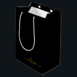 Black Gold Modern Script Girly Monogram Name Medium Gift Bag<br><div class="desc">Black and Gold Simple Script Monogram Name Gift Bag. This makes the perfect sweet 16 birthday,  wedding,  bridal shower,  anniversary,  baby shower or bachelorette party gift bag for someone that loves glam luxury and chic styles.</div>