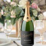 Black gold name script 70th birthday sparkling wine label<br><div class="desc">Black background. Seventy is written with a faux gold script.  Personalise and add a name and date.  White text.</div>