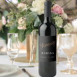 Black gold name script 70th birthday wine label<br><div class="desc">Black background. Seventy is written with a faux gold script.  Personalise and add a name and date.  White text.</div>
