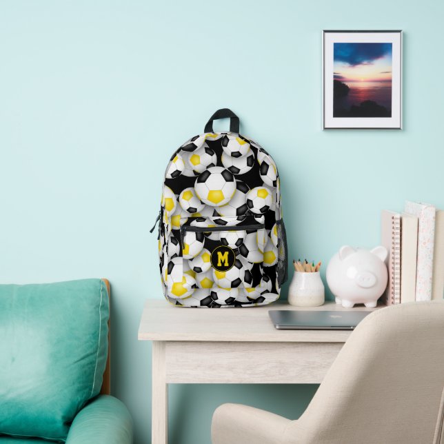black gold team colours soccer balls pattern  printed backpack (Insitu)