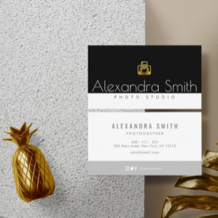 black gold white text photographer business card