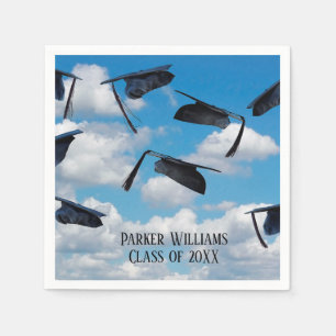 black graduation caps in sky napkin