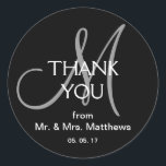 Black Grey Modern Wedding Thank You Sticker<br><div class="desc">Modern Black and Grey Customisable Monogrammed Wedding Favour Thank You Stickers with Mr. and Mrs. Last Name and wedding date options. Design by Elke Clarke©. A perfect, simple design which you can personalise for your wedding favour labels. Customise with your married names, wedding date and your monogram initial. For other...</div>