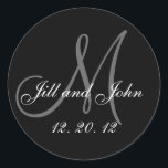 Black Grey Monogram Names 2012 Wedding Sticker<br><div class="desc">Black Grey Monogram Names 2012 Wedding Seal. Elegant wedding stickers with monogram, wedding date and bride and groom names which you can customise with your personal information and wedding colour scheme. A great sticker for wedding favour stickers, cake box labels, wedding treat bag seals, and wedding invitation envelope seals. Design...</div>