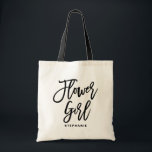 Black Hand Lettering Flower Girl Personalised Tote Bag<br><div class="desc">Customisable flower girl tote bag. Modern and classic tote bag featuring black "flower girl" hand lettering script. Personalise by adding the receiver's name,  the hashtag of the wedding or other details. Perfect as a gift for your wedding party or bridal party.</div>