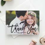 Black Hand Lettering Modern Photo Wedding Thank You Card<br><div class="desc">Express your gratitude with our customisable photo wedding thank you card, featuring elegant modern calligraphy. This design seamlessly blends personal sentiment with contemporary style, making it the perfect way to thank your guests for sharing in your special day. Showcase your favourite wedding photos adding a personal touch that captures the...</div>