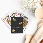 Black happy bumble bees summer fun humor name playing cards<br><div class="desc">Decorated with happy,  smiling yellow and black  bumblebees. A chic black background. Personalize and add a name. The name is written with a modern hand lettered stylie script with swashes. To keep the swashes only delete the sample name,  leave the spaces or emoji's in front and after the name.</div>