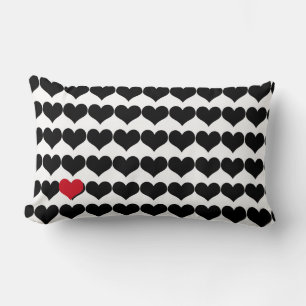 Black hearts and a single red heart lumbar cushion