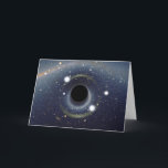 Black Hole Einstein Ring NASA Card<br><div class="desc">Simulated view of a black hole in front of the Large Magellanic Cloud. The ratio between the black hole Schwarzschild radius and the observer distance to it is 1:9. Of note is the gravitational lensing effect known as an Einstein ring, which produces a set of two fairly bright and large...</div>