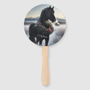 Black horse in the snow with Christmas wreath Hand Fan