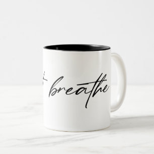 black "just breathe" text Two-Tone coffee mug