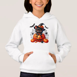 Black Kitten in a Halloween Pumpkin