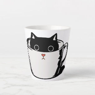 Black kitten with red nose hiding in a cup