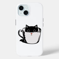 Black kitten with red nose hiding in a cup
