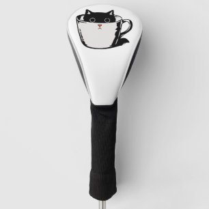 Black kitten with red nose hiding in a cup golf head cover