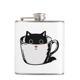 Black kitten with red nose hiding in a cup hip flask