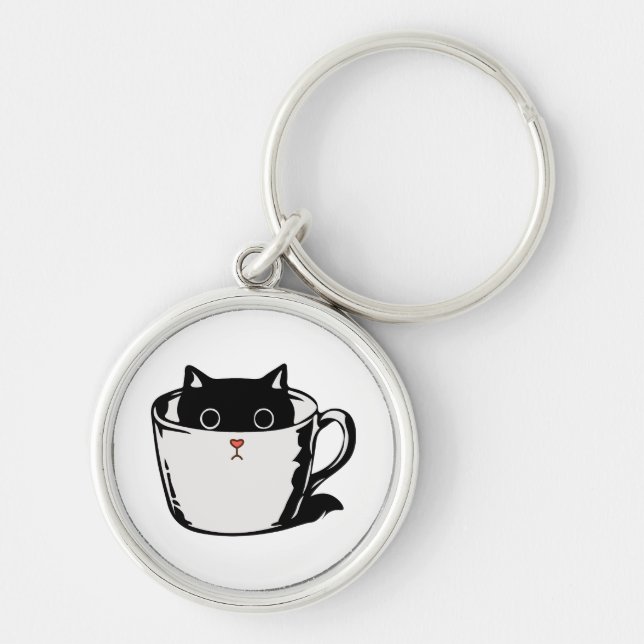 Black kitten with red nose hiding in a cup key ring (Front)