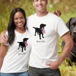 Black Lab Dog with USA American Flag, 4th of July T-Shirt<br><div class="desc">A black labrador retriever dog silhouette holds a USA American flag in it's mouth ready for the 4th of July or other patriotic celebration. Add your own text - "Happy 4th of July" or your dog's name or delete. This makes a cute, festive design for a 4th of July party...</div>