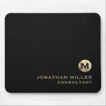 Black Leather Gold Monogram Mouse Pad<br><div class="desc">Add a touch of sophistication to your workspace with this personalised black leather and gold monogram mouse pad. The classic block typography and brushed monogram medallion with your initials make it a perfect accessory for your home or office. The smooth surface and non-slip backing provide optimal mouse performance, making this...</div>