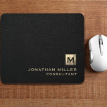 Black Leather Gold Monogram Mouse Pad<br><div class="desc">Add a touch of sophistication to your workspace with this personalised black leather and gold monogram mouse pad. The classic block typography and brushed monogram medallion with your initials make it a perfect accessory for your home or office. The smooth surface and non-slip backing provide optimal mouse performance, making this...</div>