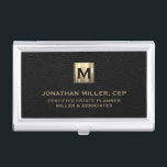 Black Leather Luxury Gold Initial Logo Business Card Holder<br><div class="desc">Simple modern luxury design with brushed metallic gold initial logo medallion with personalised name,  title,  company name or custom text below in classic block typography on a black leather textured background. Personalise for your custom use.</div>