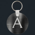 Black Modern Faux Stainless Steel Monogram Key Ring<br><div class="desc">Modern and Elegant Black Faux Stainless Steel Metallic Elegant Keychain. These Keychains can be customized to include your initial and first name. These key chains make great birthday,  bridal shower or bachelorette party favors.</div>