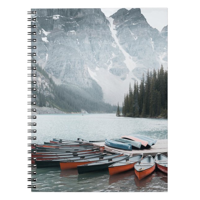 BLACK MOUNTAIN COVERED WITH SNOW UNDER GREY SKY NOTEBOOK (Front)