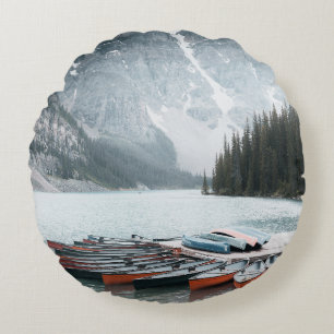 BLACK MOUNTAIN COVERED WITH SNOW UNDER GREY SKY ROUND CUSHION