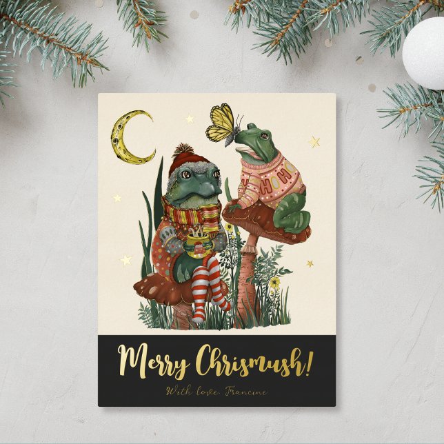 Black Mushroom Frog and Toad Merry Christmas   Foi Foil Holiday Postcard (Black & Gold Merry Christmas card with an illustration of frogs sitting on mushrooms drinking cocoa)