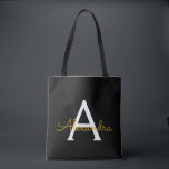 Black Name Gold Girly Script Monogram Modern Tote Bag<br><div class="desc">Black and Gold Elegant Add Your Own Name Monogram Book Bag. This Book Bag can be customised to include your initial and first name and given as a gift for Christmas,  Sweet 16 Birthday,  Bridal Shower or a Wedding.</div>