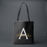 Black Name Gold Girly Script Monogram Modern Tote Bag<br><div class="desc">Black and Gold Elegant Add Your Own Name Monogram Book Bag. This Book Bag can be customised to include your initial and first name and given as a gift for Christmas,  Sweet 16 Birthday,  Bridal Shower or a Wedding.</div>