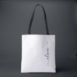 Black Name White Girly Script Monogram Modern Tote Bag<br><div class="desc">Black and White Elegant Add Your Own Name Monogram Book Bag. This Book Bag can be customised to include your initial and first name and given as a gift for Christmas,  Sweet 16 Birthday,  Bridal Shower or a Wedding.</div>
