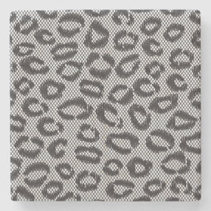 Black net lace with leopard pattern on white stone coaster