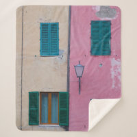 BLACK OUTDOOR SCONCE ON PINK PAINTED WALL