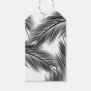 Black palm leaves on white background gift tags
