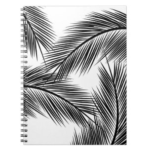 Black palm leaves on white background notebook