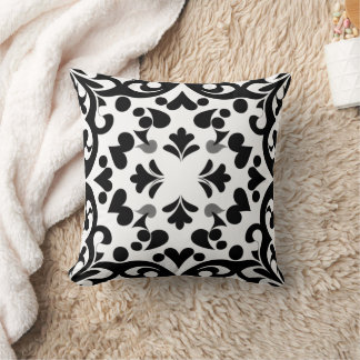 black pattern on white background cushion