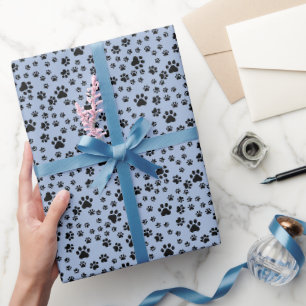Black Paw Prints on Light Blue Wrapping Paper