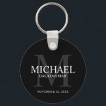 Black Personalised Groomsmen's name and monogram Key Ring<br><div class="desc">Add a personal touch to your wedding with personalised groomsmen keychain. This keychain features personalised groomsman's name with title and wedding date in white and monogram in grey as background, in classic serif font style, on black background. Also perfect for best man, father of the bride, ring bearer and more....</div>