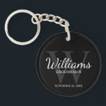 Black Personalised Script Groomsmen name&Monogram  Key Ring<br><div class="desc">Add a personal touch to your wedding with personalised groomsmen keychain. This keychain features personalised groomsman's name in white classic script font style with wedding details in white classic serif font style and monogram in grey classic serif font style as background, on black background. Also perfect for best man, father...</div>