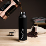 Black Personalised Wedding Bridesmaid Water Bottle<br><div class="desc">Gift your wedding bridesmaid or maid of honour with this trendy,  vacuum Insulated water bottle that features her name in white,  stylised script on a solid black background. Personalise bottle by editing and replacing name with your own as desired. Select your water bottle style.</div>