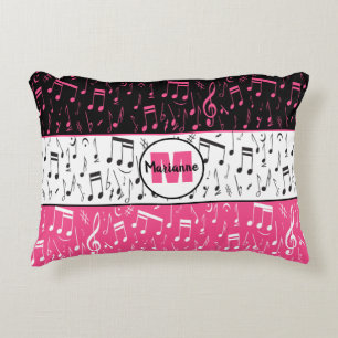 Black pink and white music notes accent pillow